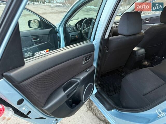 Синий Мазда 3, объемом двигателя 1.6 л и пробегом 241 тыс. км за 4750 $, фото 25 на Automoto.ua