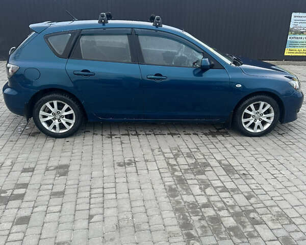 Синий Мазда 3, объемом двигателя 1.6 л и пробегом 310 тыс. км за 4500 $, фото 1 на Automoto.ua
