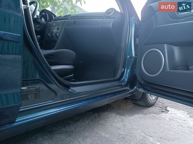 Синий Мазда 3, объемом двигателя 1.6 л и пробегом 191 тыс. км за 5299 $, фото 84 на Automoto.ua