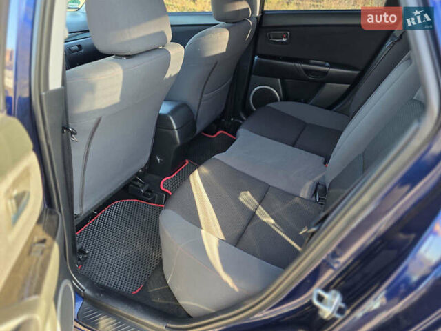 Синий Мазда 3, объемом двигателя 1.6 л и пробегом 240 тыс. км за 5500 $, фото 9 на Automoto.ua