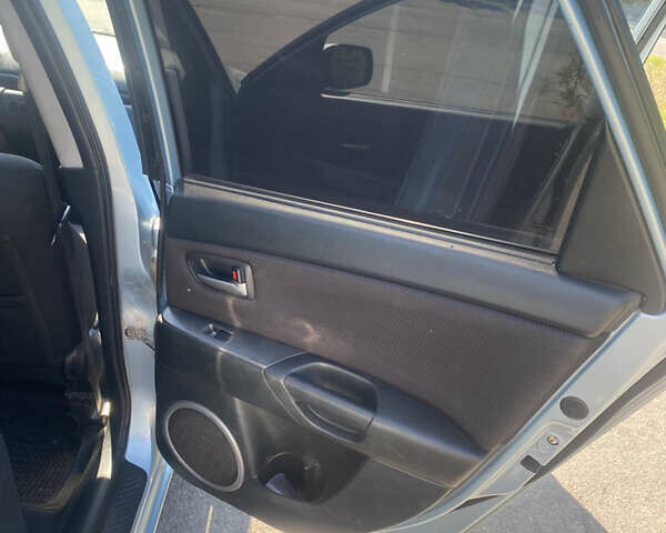 Синій Мазда 3, об'ємом двигуна 1.56 л та пробігом 321 тис. км за 4299 $, фото 17 на Automoto.ua