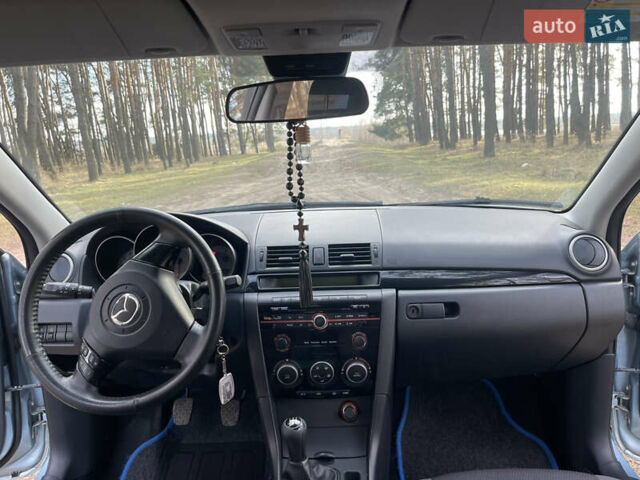 Синий Мазда 3, объемом двигателя 1.6 л и пробегом 227 тыс. км за 5400 $, фото 52 на Automoto.ua