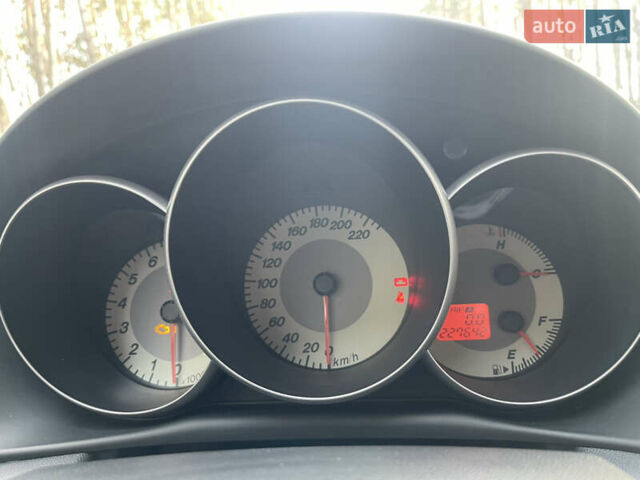 Синий Мазда 3, объемом двигателя 1.6 л и пробегом 227 тыс. км за 5400 $, фото 55 на Automoto.ua