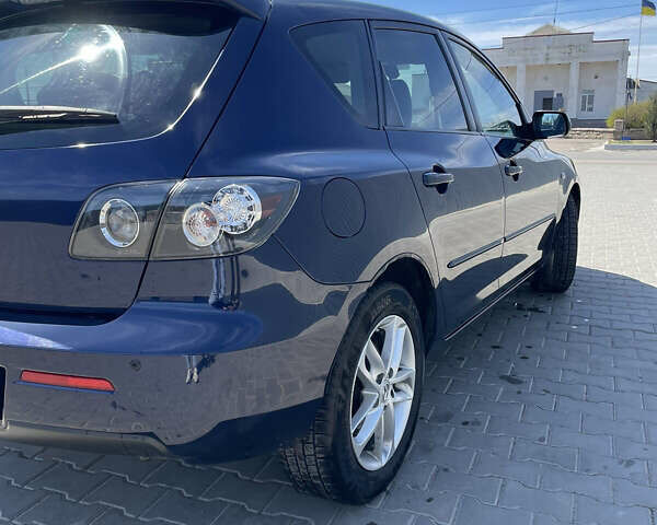 Синий Мазда 3, объемом двигателя 2 л и пробегом 260 тыс. км за 6300 $, фото 3 на Automoto.ua