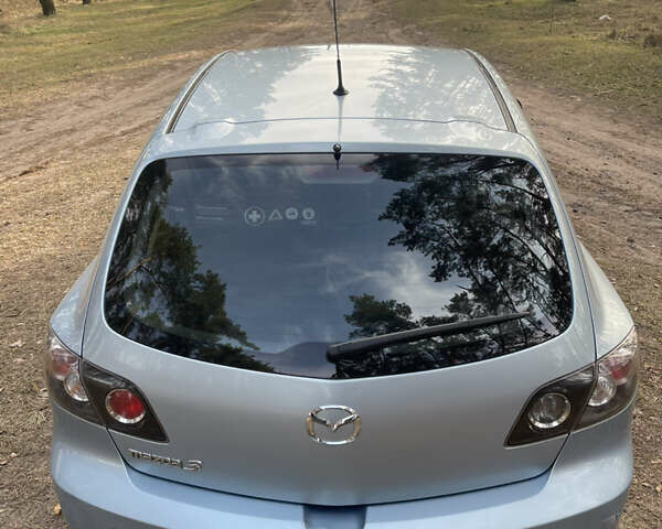 Синий Мазда 3, объемом двигателя 1.6 л и пробегом 227 тыс. км за 5400 $, фото 7 на Automoto.ua