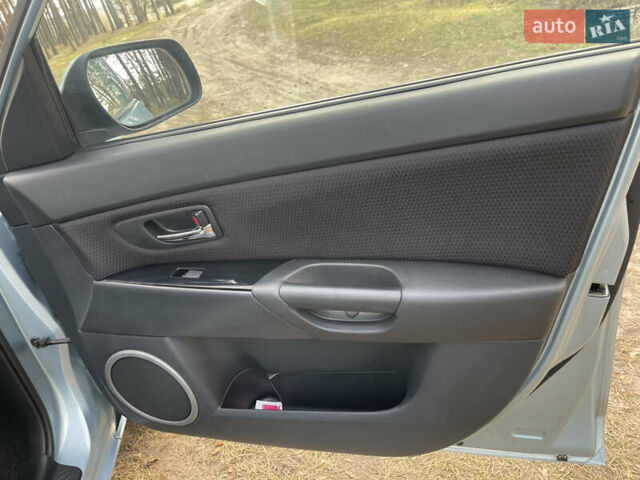 Синий Мазда 3, объемом двигателя 1.6 л и пробегом 227 тыс. км за 5400 $, фото 37 на Automoto.ua