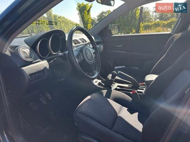 Синий Мазда 3, объемом двигателя 1.6 л и пробегом 190 тыс. км за 5399 $, фото 11 на Automoto.ua