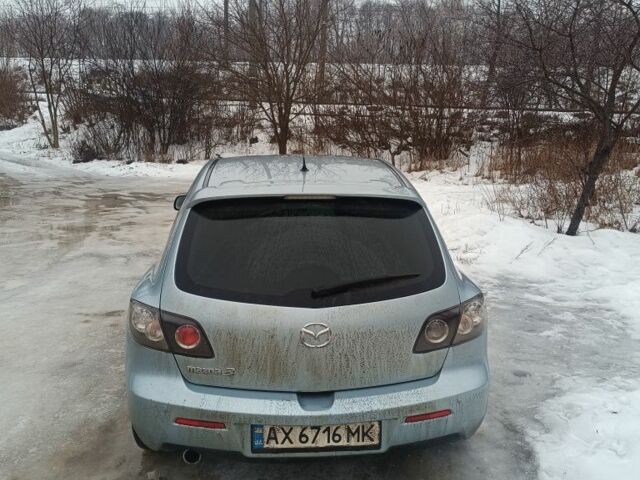 Синий Мазда 3, объемом двигателя 2 л и пробегом 210 тыс. км за 3945 $, фото 3 на Automoto.ua