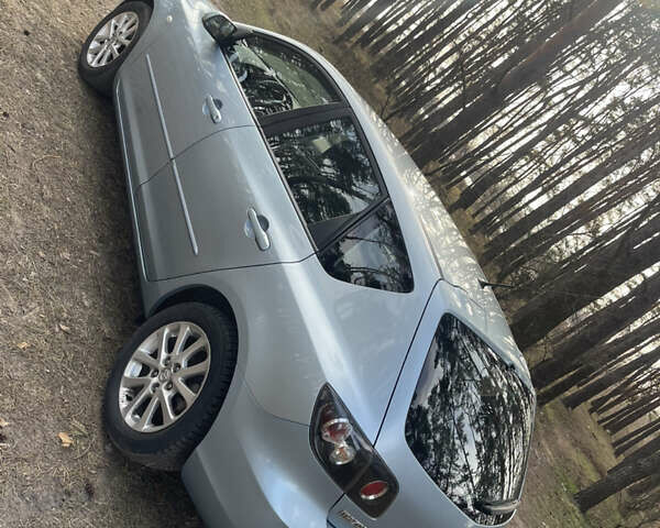 Синий Мазда 3, объемом двигателя 1.6 л и пробегом 227 тыс. км за 5400 $, фото 4 на Automoto.ua