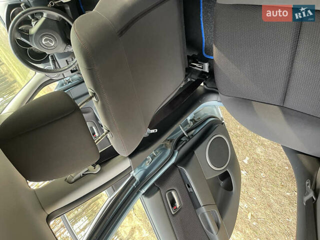 Синий Мазда 3, объемом двигателя 1.6 л и пробегом 227 тыс. км за 5400 $, фото 53 на Automoto.ua