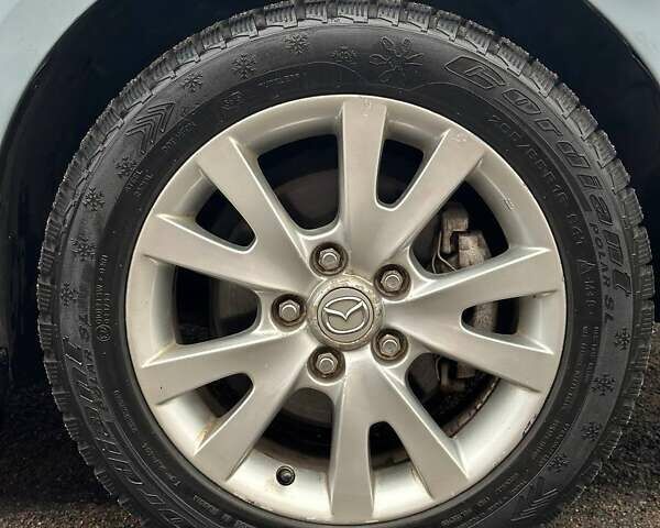 Синій Мазда 3, об'ємом двигуна 1.6 л та пробігом 145 тис. км за 5655 $, фото 13 на Automoto.ua