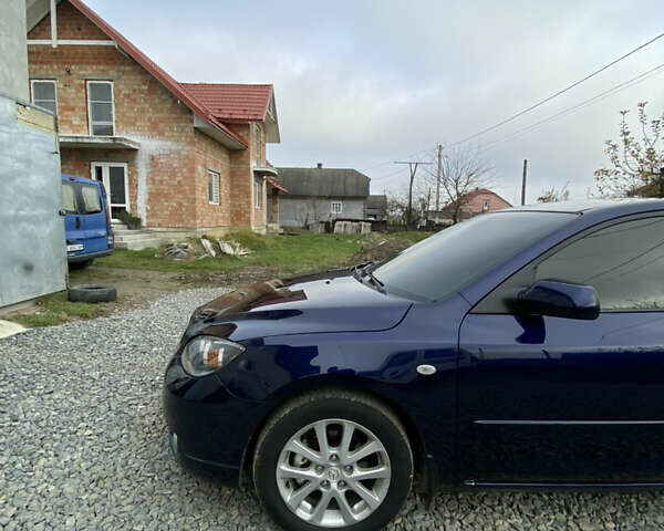 Синий Мазда 3, объемом двигателя 1.6 л и пробегом 188 тыс. км за 6200 $, фото 4 на Automoto.ua