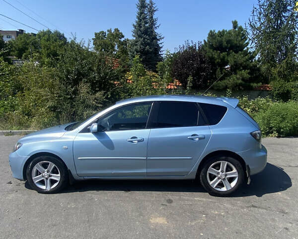 Синій Мазда 3, об'ємом двигуна 1.56 л та пробігом 321 тис. км за 4299 $, фото 8 на Automoto.ua
