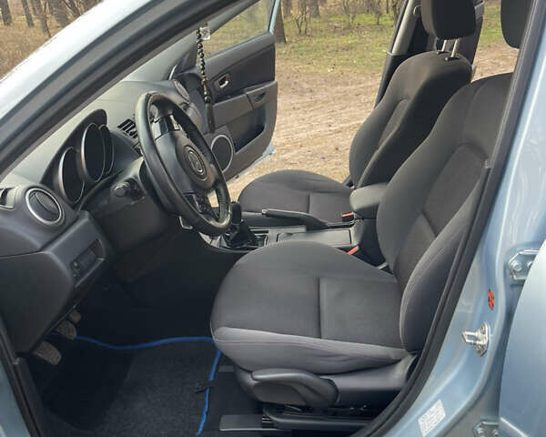 Синий Мазда 3, объемом двигателя 1.6 л и пробегом 227 тыс. км за 5400 $, фото 28 на Automoto.ua
