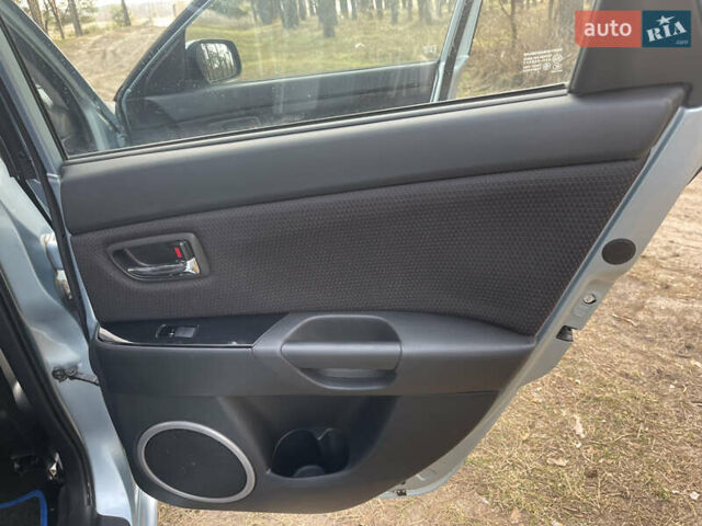 Синий Мазда 3, объемом двигателя 1.6 л и пробегом 227 тыс. км за 5400 $, фото 38 на Automoto.ua