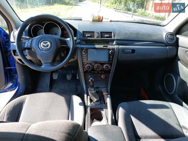 Синий Мазда 3, объемом двигателя 1.6 л и пробегом 194 тыс. км за 5500 $, фото 7 на Automoto.ua