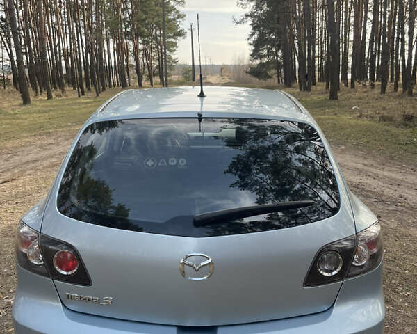 Синий Мазда 3, объемом двигателя 1.6 л и пробегом 227 тыс. км за 5400 $, фото 6 на Automoto.ua