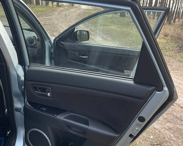 Синий Мазда 3, объемом двигателя 1.6 л и пробегом 227 тыс. км за 5400 $, фото 33 на Automoto.ua