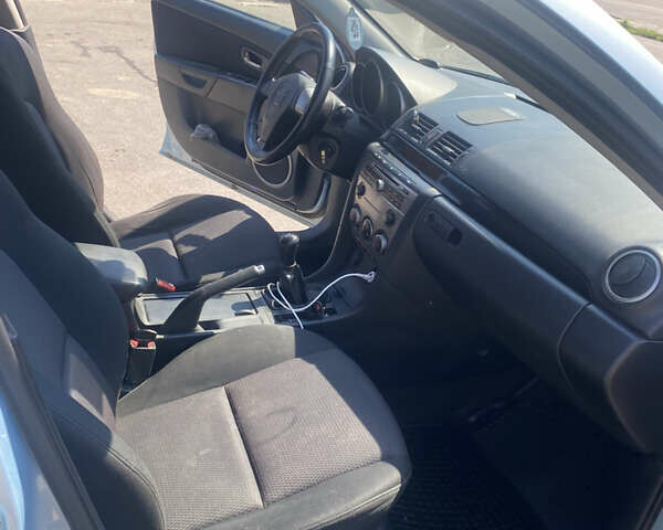 Синій Мазда 3, об'ємом двигуна 1.56 л та пробігом 321 тис. км за 4299 $, фото 14 на Automoto.ua