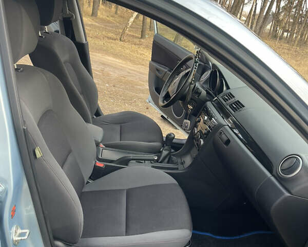 Синий Мазда 3, объемом двигателя 1.6 л и пробегом 227 тыс. км за 5400 $, фото 43 на Automoto.ua