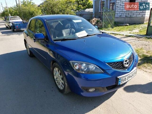 Синий Мазда 3, объемом двигателя 1.6 л и пробегом 194 тыс. км за 5500 $, фото 1 на Automoto.ua