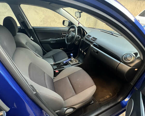 Синий Мазда 3, объемом двигателя 1.56 л и пробегом 247 тыс. км за 6500 $, фото 9 на Automoto.ua