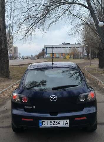 Синій Мазда 3, об'ємом двигуна 1.56 л та пробігом 219 тис. км за 5700 $, фото 4 на Automoto.ua