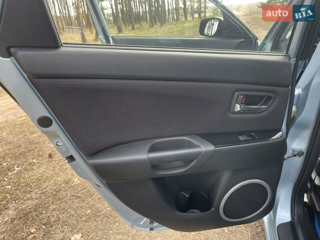 Синий Мазда 3, объемом двигателя 1.6 л и пробегом 227 тыс. км за 5400 $, фото 39 на Automoto.ua