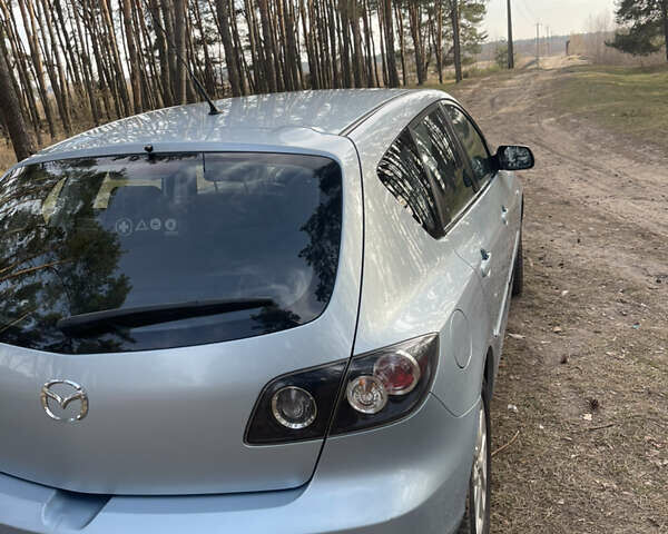 Синий Мазда 3, объемом двигателя 1.6 л и пробегом 227 тыс. км за 5400 $, фото 9 на Automoto.ua