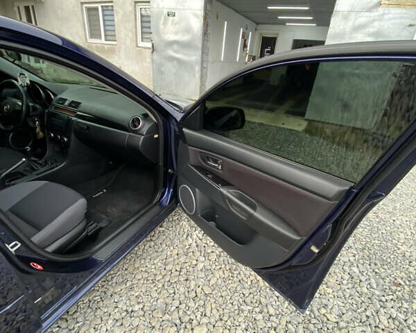 Синий Мазда 3, объемом двигателя 1.6 л и пробегом 188 тыс. км за 6200 $, фото 9 на Automoto.ua