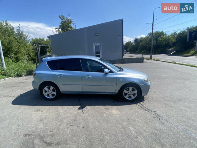 Синій Мазда 3, об'ємом двигуна 1.56 л та пробігом 321 тис. км за 4299 $, фото 4 на Automoto.ua