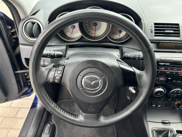 Синий Мазда 3, объемом двигателя 1.6 л и пробегом 210 тыс. км за 5700 $, фото 23 на Automoto.ua