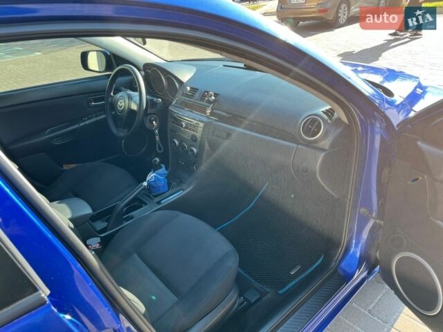 Синий Мазда 3, объемом двигателя 1.6 л и пробегом 309 тыс. км за 6000 $, фото 17 на Automoto.ua