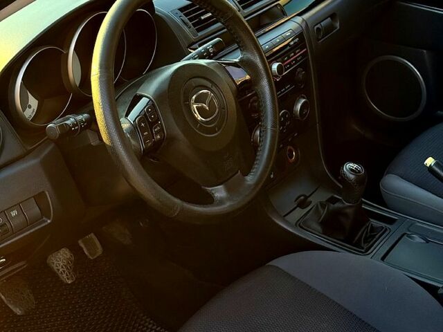 Синій Мазда 3, об'ємом двигуна 1.6 л та пробігом 205 тис. км за 3600 $, фото 4 на Automoto.ua