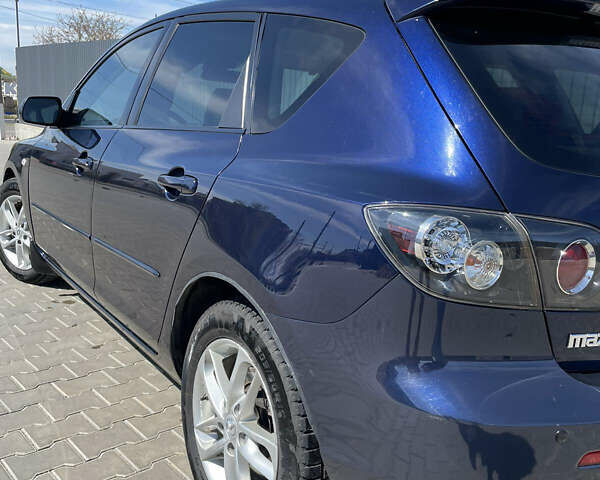 Синий Мазда 3, объемом двигателя 2 л и пробегом 260 тыс. км за 6300 $, фото 6 на Automoto.ua
