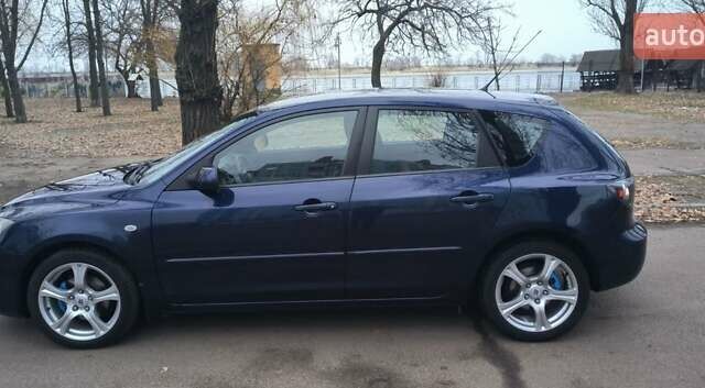Синій Мазда 3, об'ємом двигуна 1.56 л та пробігом 219 тис. км за 5700 $, фото 3 на Automoto.ua