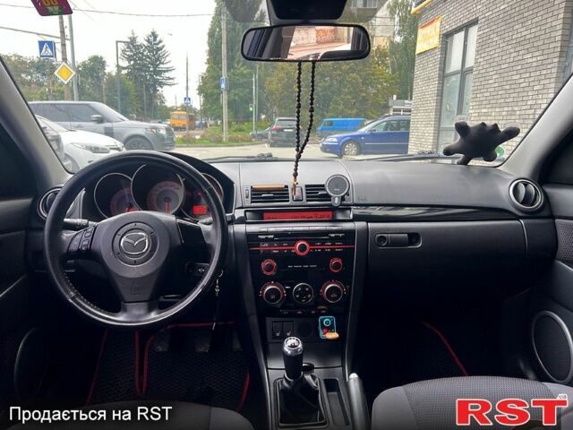 Синій Мазда 3, об'ємом двигуна 1.6 л та пробігом 240 тис. км за 6350 $, фото 3 на Automoto.ua