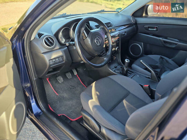 Синий Мазда 3, объемом двигателя 1.6 л и пробегом 240 тыс. км за 5500 $, фото 11 на Automoto.ua