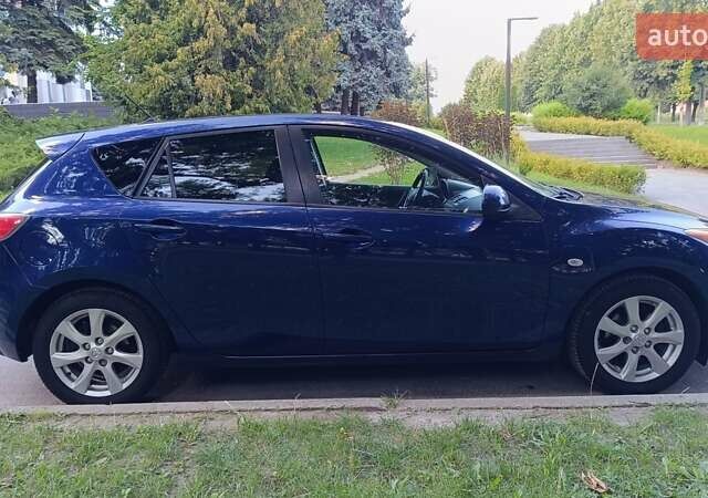 Синий Мазда 3, объемом двигателя 1.6 л и пробегом 227 тыс. км за 6100 $, фото 5 на Automoto.ua