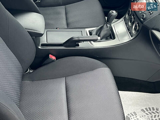 Синий Мазда 3, объемом двигателя 1.6 л и пробегом 189 тыс. км за 6700 $, фото 69 на Automoto.ua