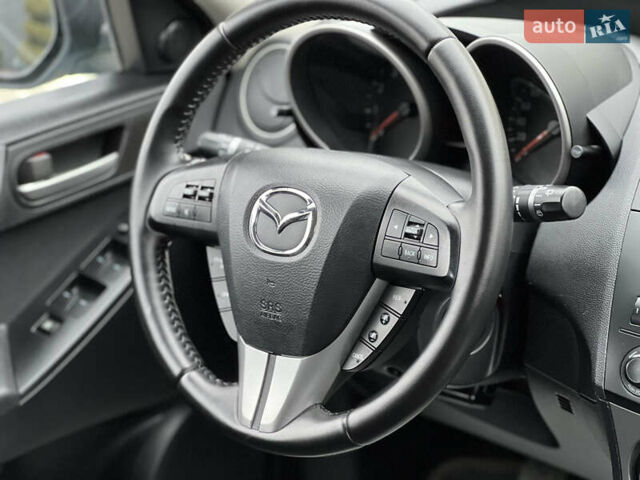 Синий Мазда 3, объемом двигателя 1.6 л и пробегом 189 тыс. км за 6700 $, фото 64 на Automoto.ua