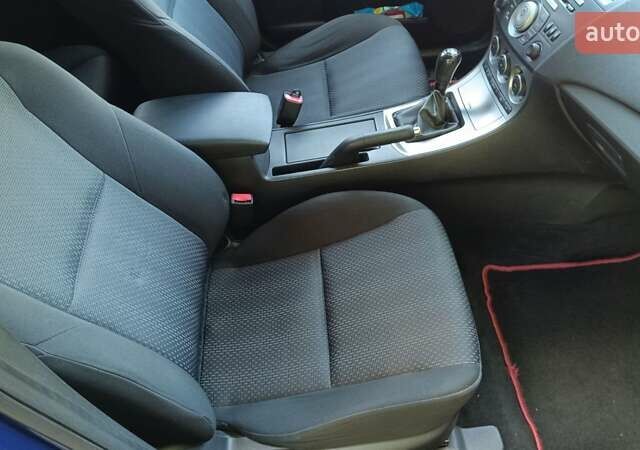 Синий Мазда 3, объемом двигателя 1.6 л и пробегом 227 тыс. км за 6100 $, фото 15 на Automoto.ua