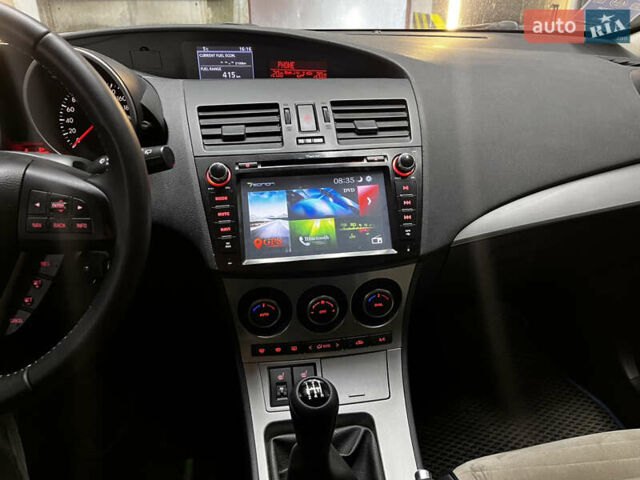 Синий Мазда 3, объемом двигателя 1.6 л и пробегом 162 тыс. км за 8500 $, фото 15 на Automoto.ua