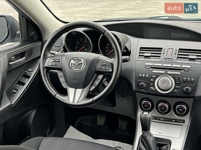 Синий Мазда 3, объемом двигателя 1.6 л и пробегом 189 тыс. км за 6399 $, фото 71 на Automoto.ua