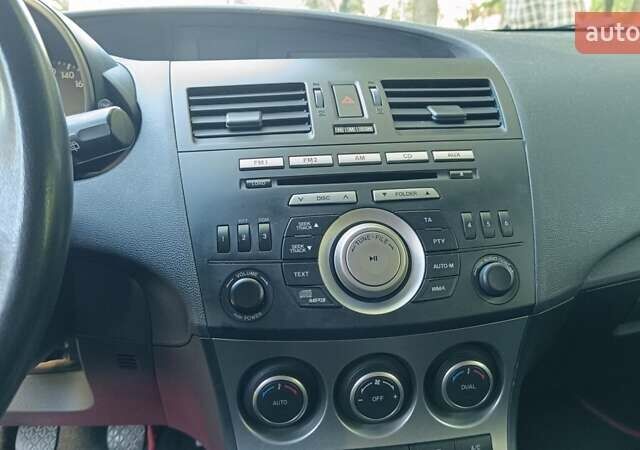 Синий Мазда 3, объемом двигателя 1.6 л и пробегом 227 тыс. км за 6100 $, фото 11 на Automoto.ua