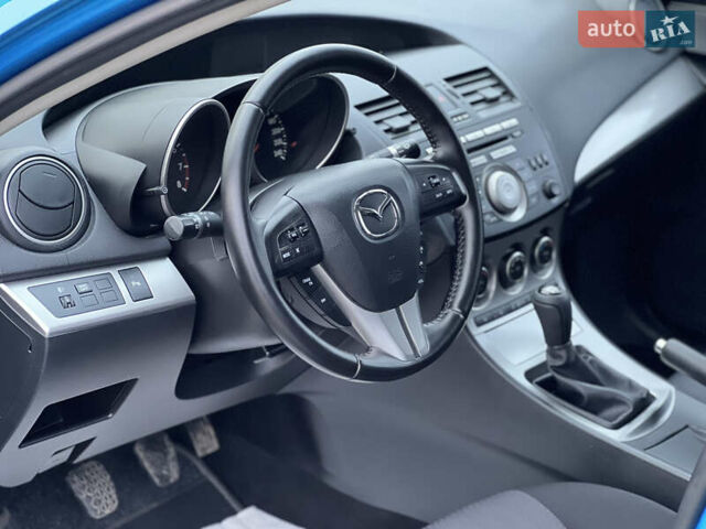 Синий Мазда 3, объемом двигателя 1.6 л и пробегом 189 тыс. км за 6700 $, фото 52 на Automoto.ua