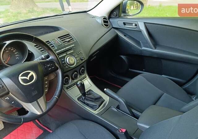 Синий Мазда 3, объемом двигателя 1.6 л и пробегом 227 тыс. км за 6100 $, фото 12 на Automoto.ua