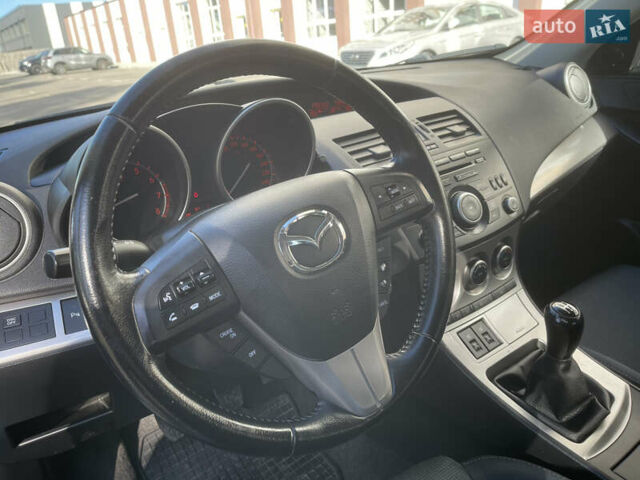 Синий Мазда 3, объемом двигателя 1.6 л и пробегом 224 тыс. км за 6400 $, фото 23 на Automoto.ua