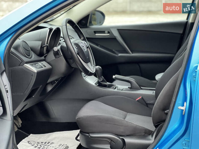 Синий Мазда 3, объемом двигателя 1.6 л и пробегом 189 тыс. км за 6399 $, фото 56 на Automoto.ua