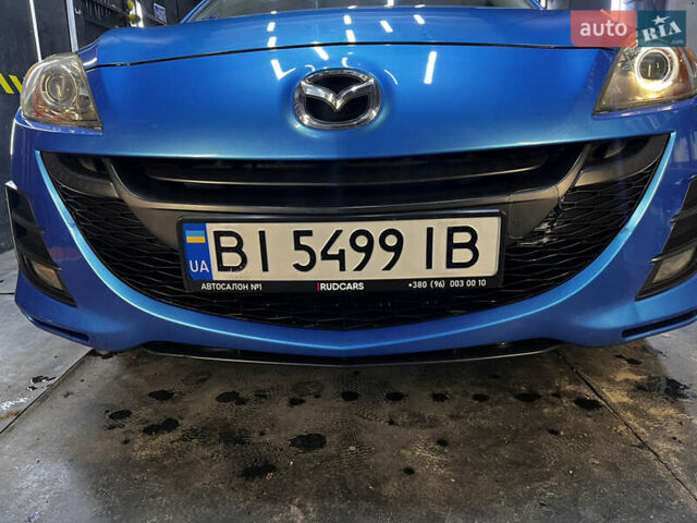 Синий Мазда 3, объемом двигателя 1.6 л и пробегом 162 тыс. км за 8500 $, фото 23 на Automoto.ua